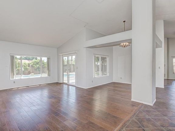 Living and Dining with wood flooring.