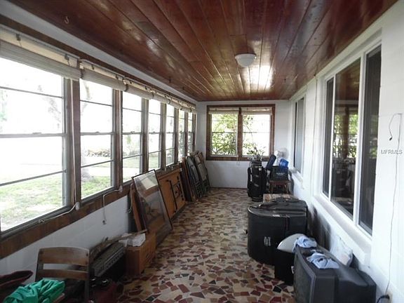 Florida Room with lovely wood ceilings