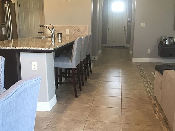 Entry Way / Open Concept Kitchen and Living Area