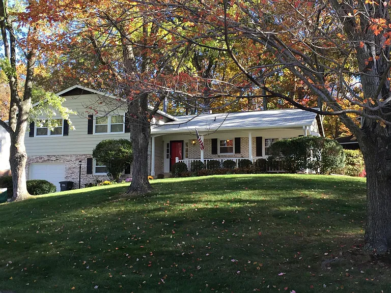 Large corner lot in great country club view neighborhood. Walk to school!