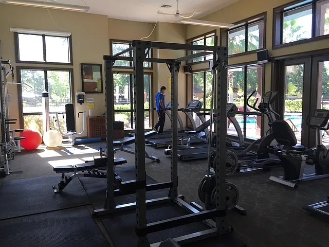 Gym overlooking pool