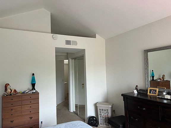 Master Bedroom looking out to the hall, 1 of 2 closets.
