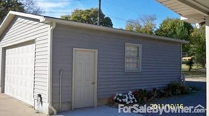 2 car detached garage
						:
						remote door opener