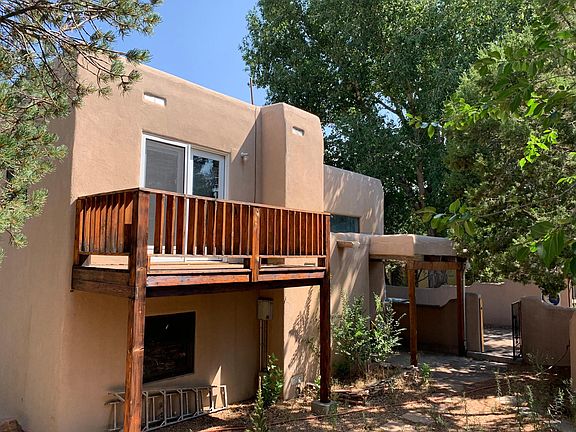 Front of house showing Guest Suite Balcony and front entrance