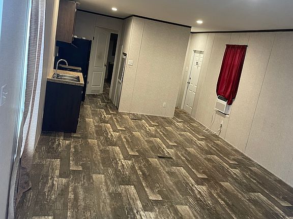 Kitchen & living room. Washer & dryer connections near back door.