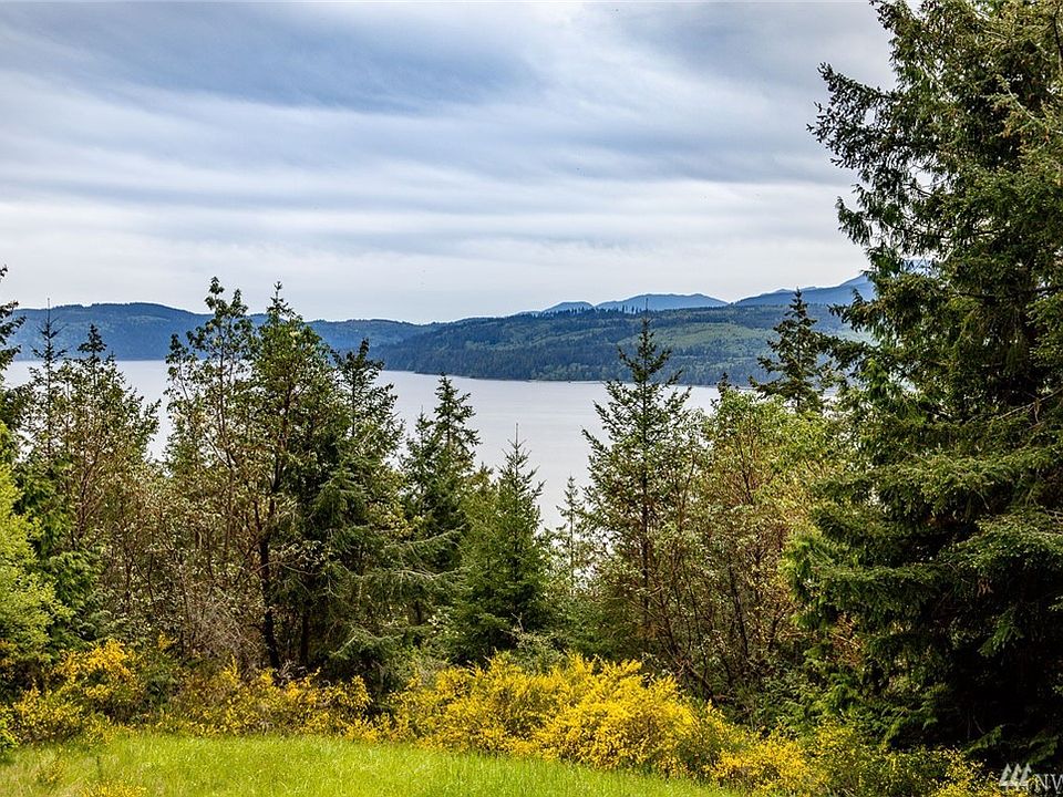 Custom cabin on a serene five acres with views of Discovery Bay and the Olympics.