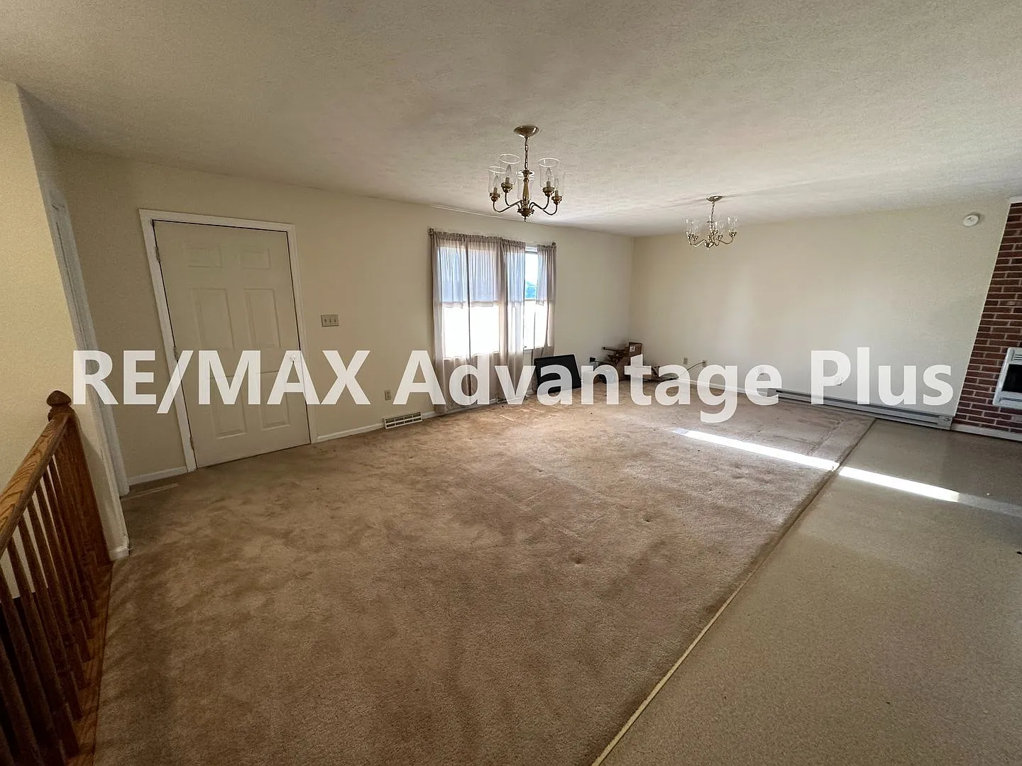 Well-Maintained 2-Bedroom Home with Attached Garage and Walkout Basement! — Photo 2