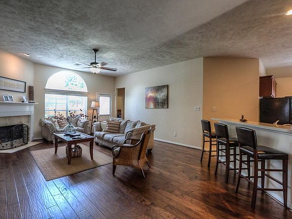 Fantastic open floor plan with beautiful hardwoods throughout main living areas.
