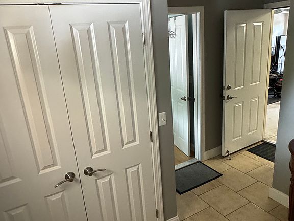 First floor hall with access to garage