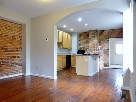 Open 1st Floor w/ Lots of Windows & Exposed Brick!
