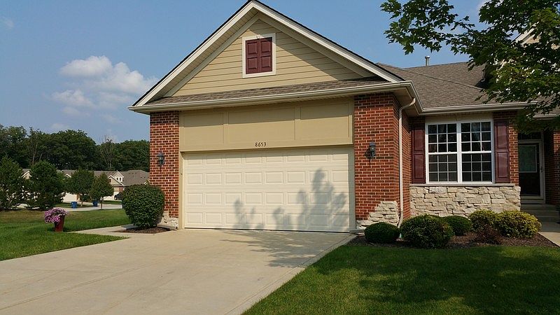 Lake Hills Town House
						:
						End front view.