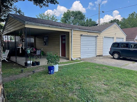 Shared patio area and detached 3-car garage.