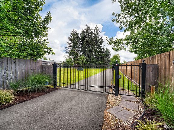 The property is secured behind its own private gated entry.