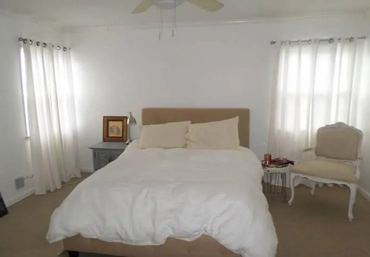 Bed room with 2 closets and light