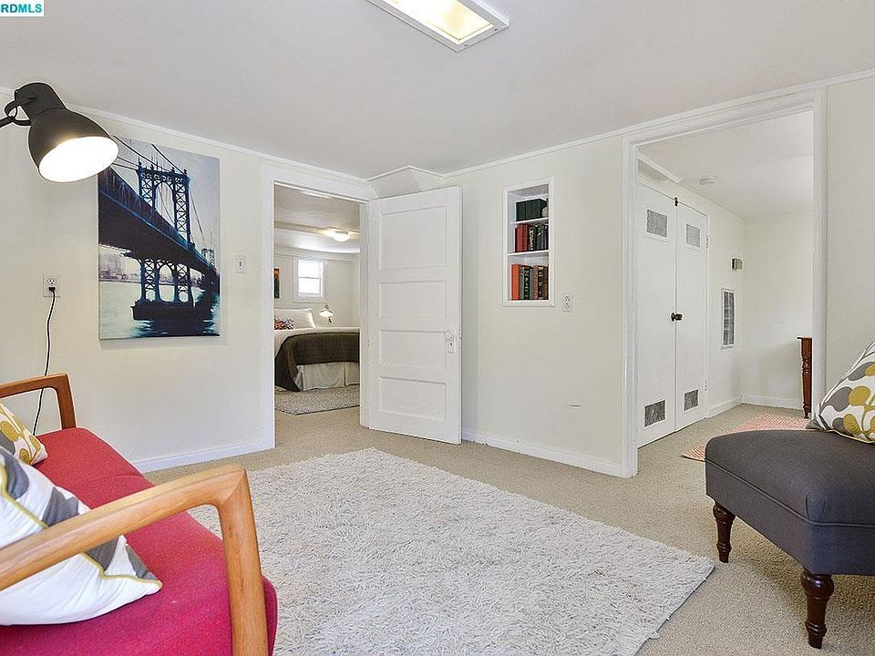 Front door opens to entry/small living area