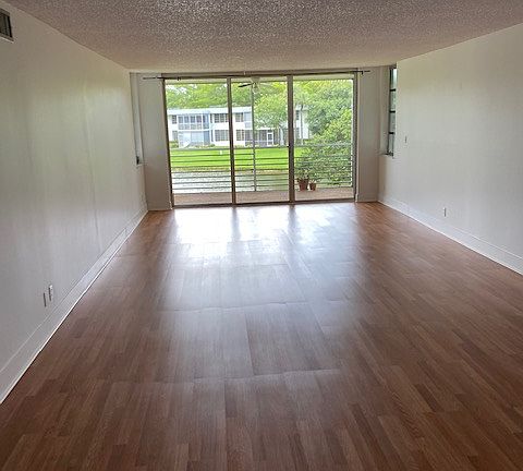 5th image of 4221 W Palm Aire Dr APT 205