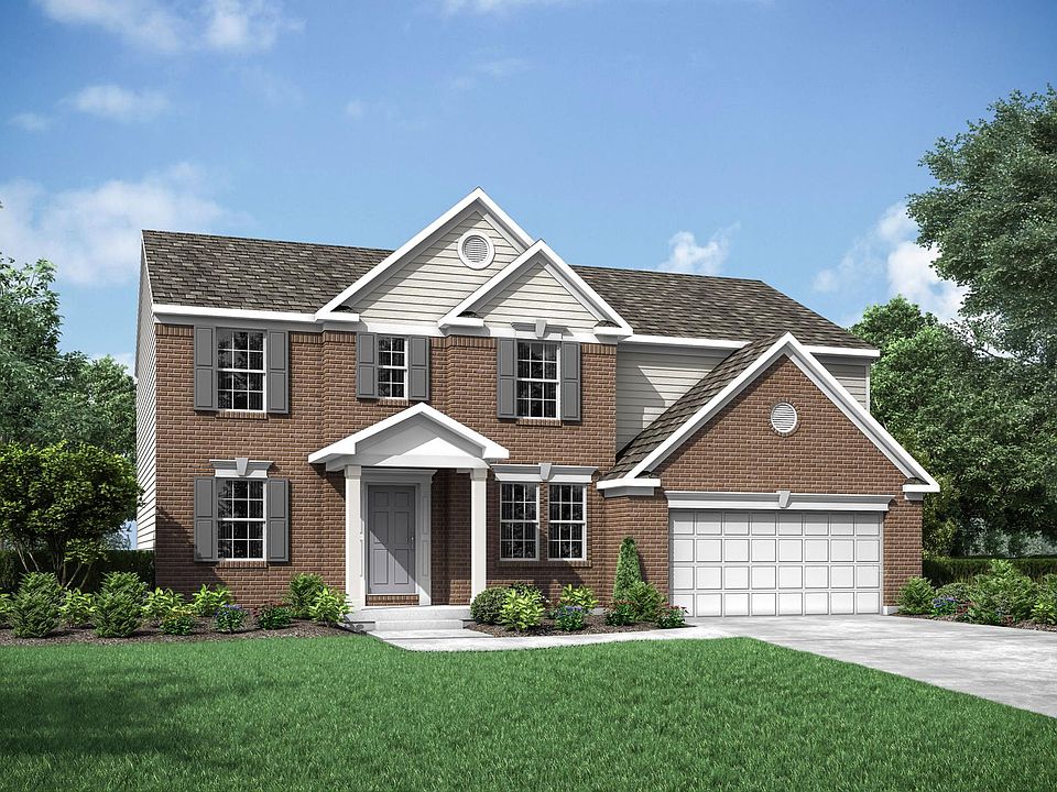 two-story home with brick and siding