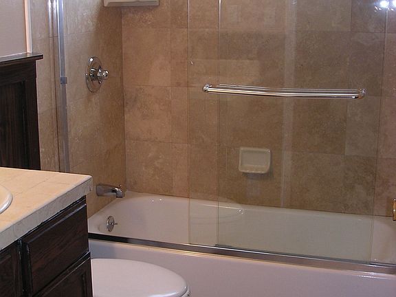 Hall Bath with Marble Tiling