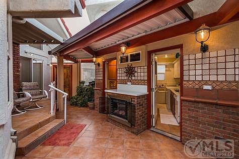 Covered Back Patio w/ Fireplace & BBQ