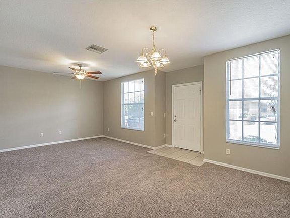 Living/Dining Area before Floors changed from carpet to wood