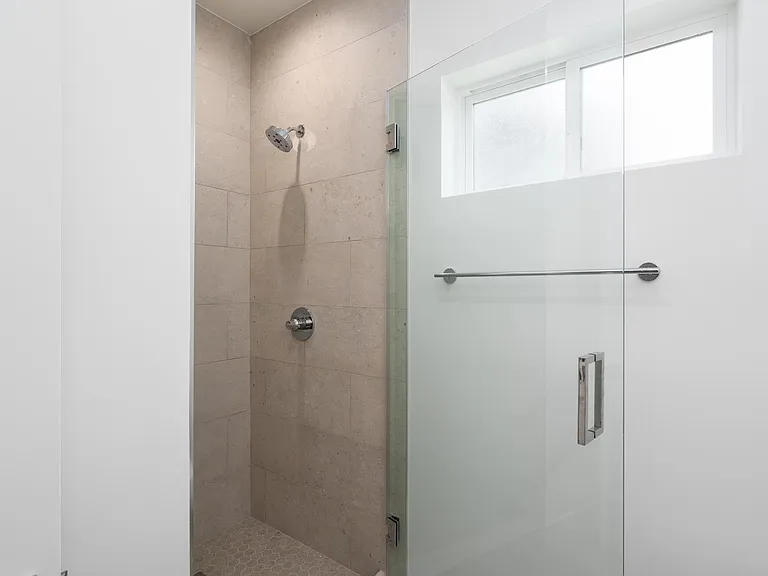 Stall shower in guest bathroom