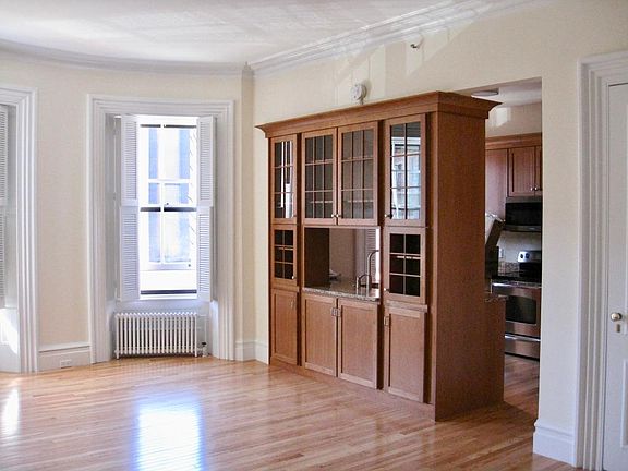 Right side of the unit with kitchen storage and pass through.