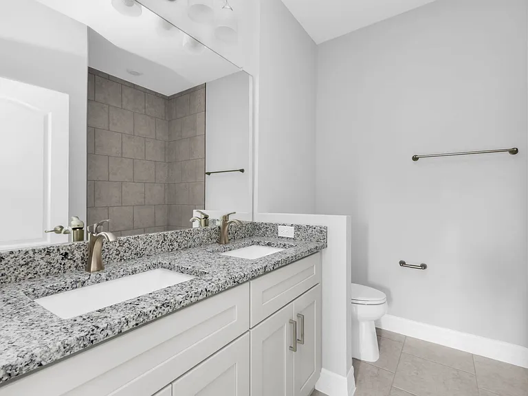 Builder provided photos - actual layout is reversed. Specific finishes may vary.