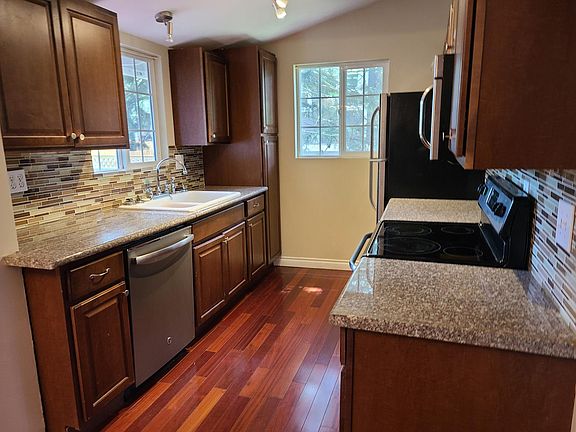 Kitchen with all stainless steel appliances.