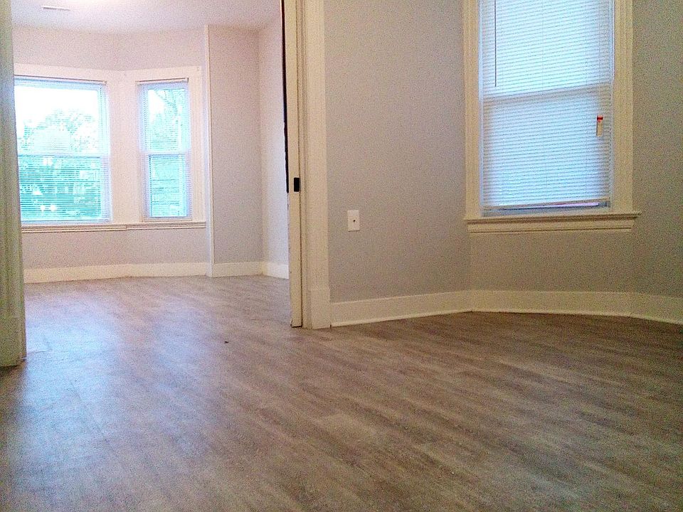 View of the dining room/living room to the living room/master