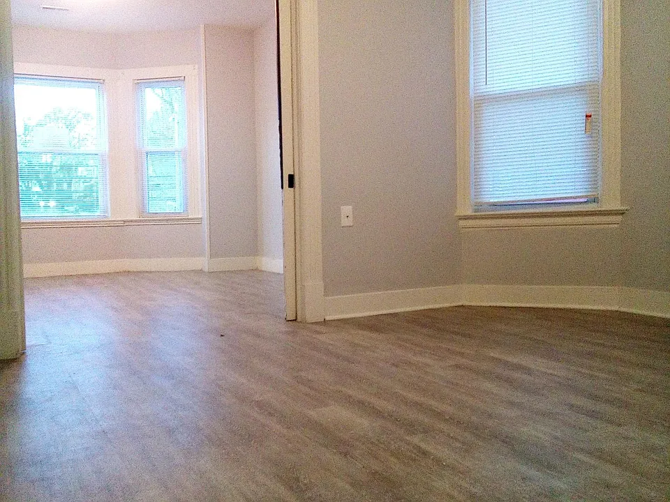 View of the dining room/living room to the living room/master