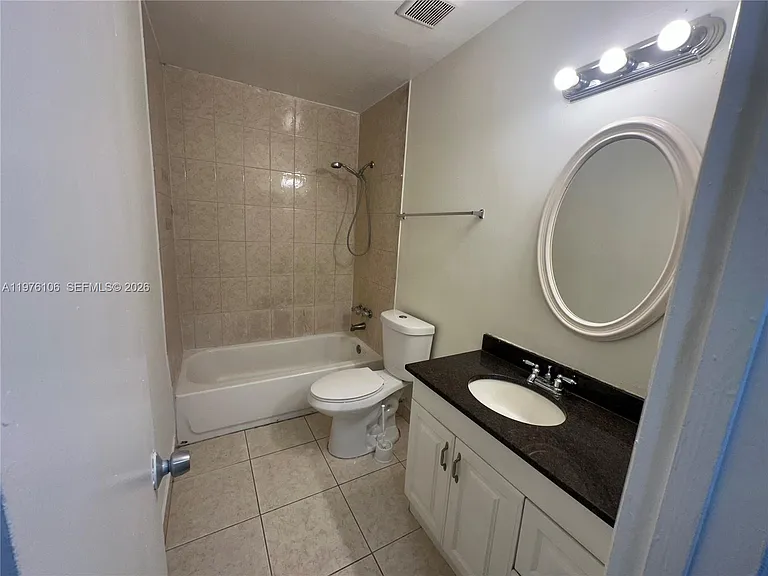 3033 NW 68th St #12E — Photo 14