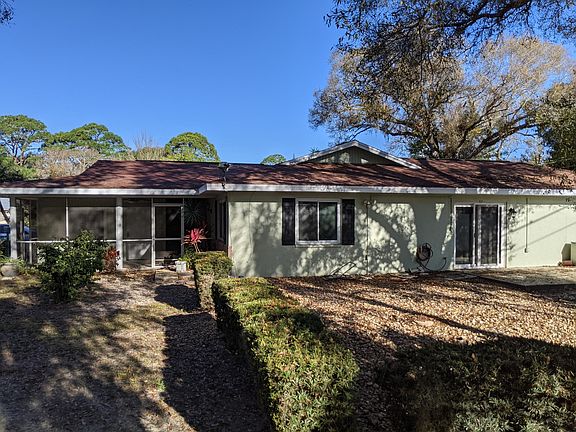 Side view from large fenced yard