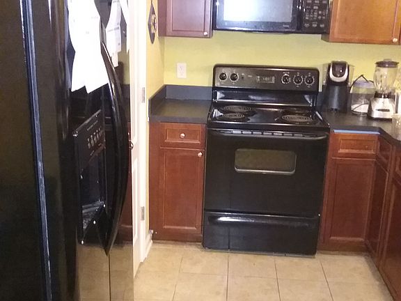 Kitchen with bar seating attached