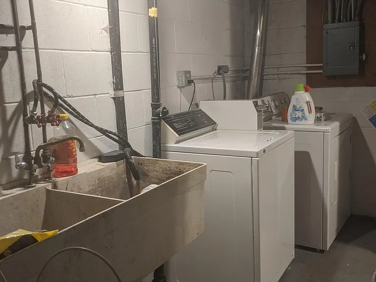 laundry room- newer laundry tub has been installed since this photo was taken.