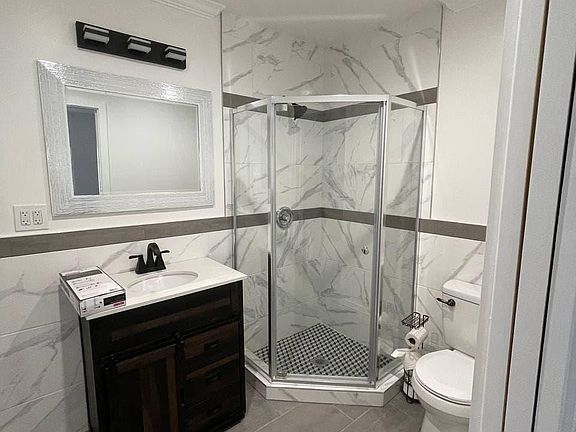 View of the bathroom. The bathroom is fully vented