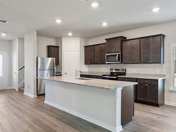 The upgraded kitchen has a convenient island.