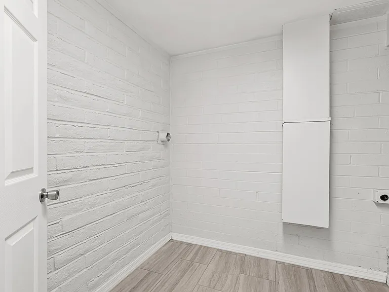 Convenient laundry room tucked away for easy day-to-day living.