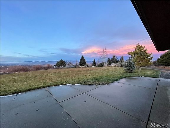 You can enjoy both the sunrise and the sunsets from this spacious patio.