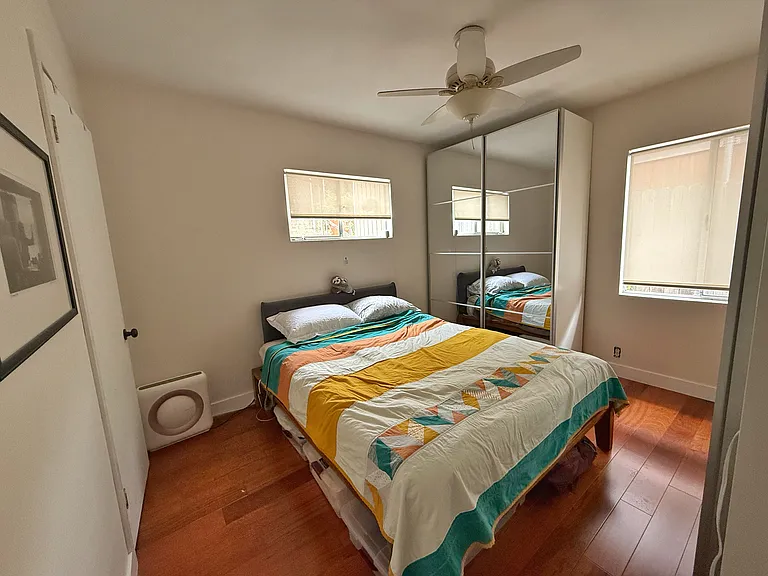 Bedroom with additional closets