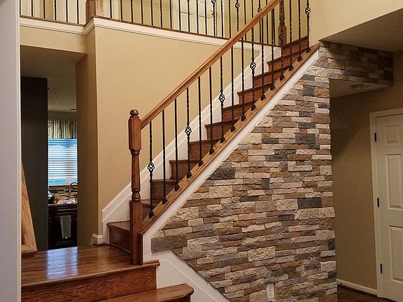 Bricked 2 story foyer