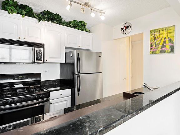 5th image of 1641 3rd Ave APT 31F