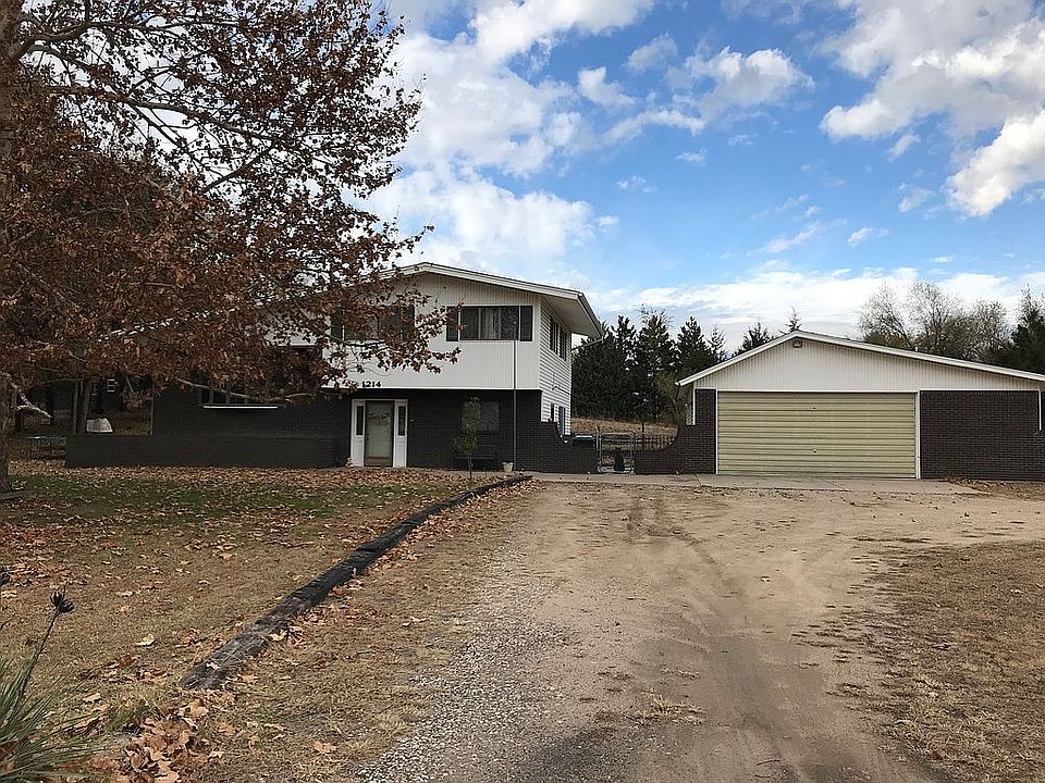 1st image of 1214 E 56th Ave