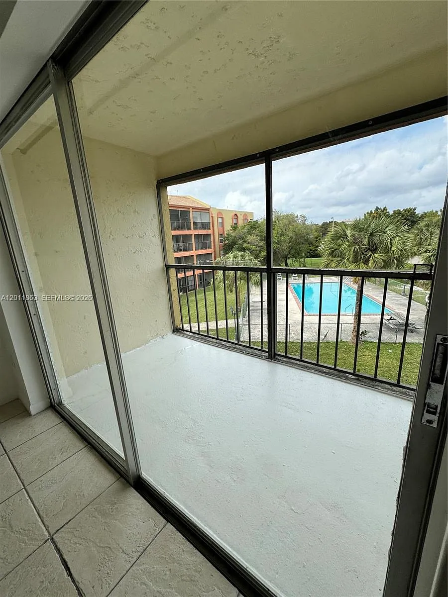 Building Photo - 9405 W Flagler St #302-D