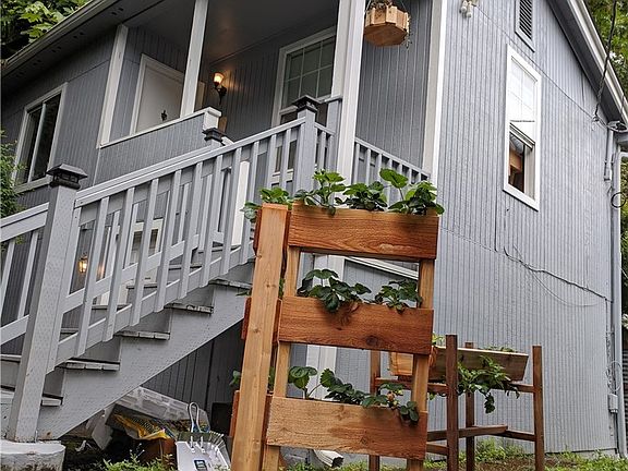Side stairs to access all units.