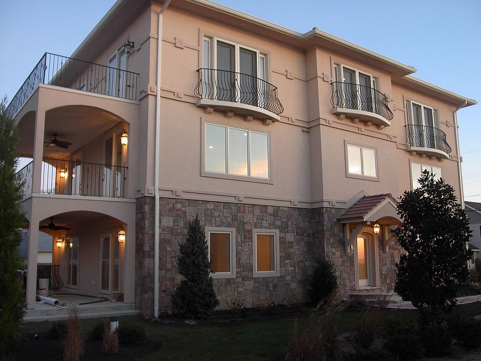 3 Custom levels w/decks & water views