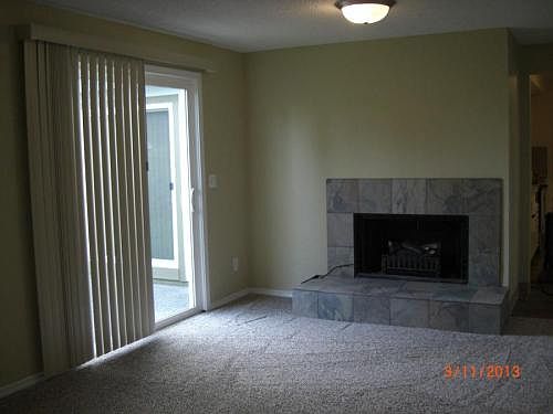 Built-in fireplace with brand new electric fireplace insert.