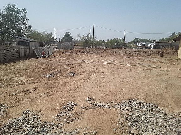 The back of the lot has a raise-up pad for a future project. The renter is welcome to place steel shipping containers on the pad 