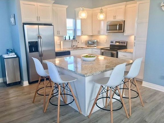 Kitchen with SS appliances and great island