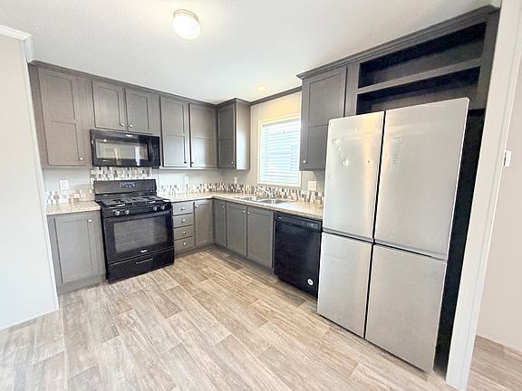 5th image of 534 E 37th Ave Lot 650