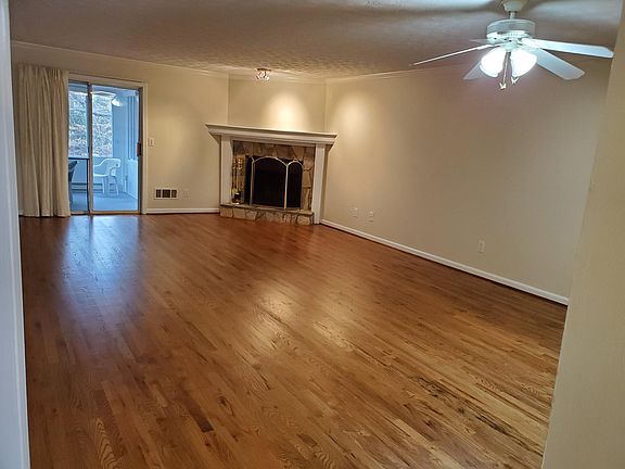 Large Living Room/Dining Room combination.Real wood floors. Gas log fireplace.